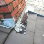 Chimney Repair. Close-up of a brick chimney repair